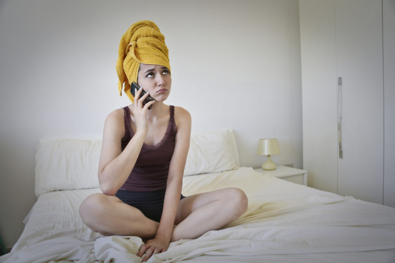Woman Bed On Phone Upset