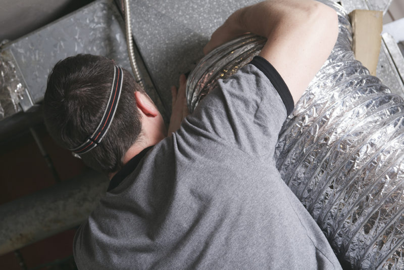Man Sealing Duct