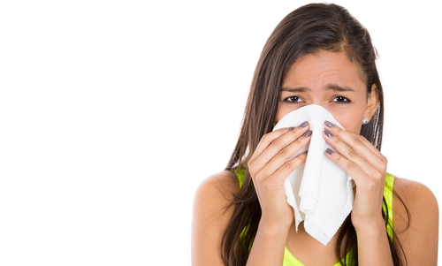 Woman Blowing Nose Allergies